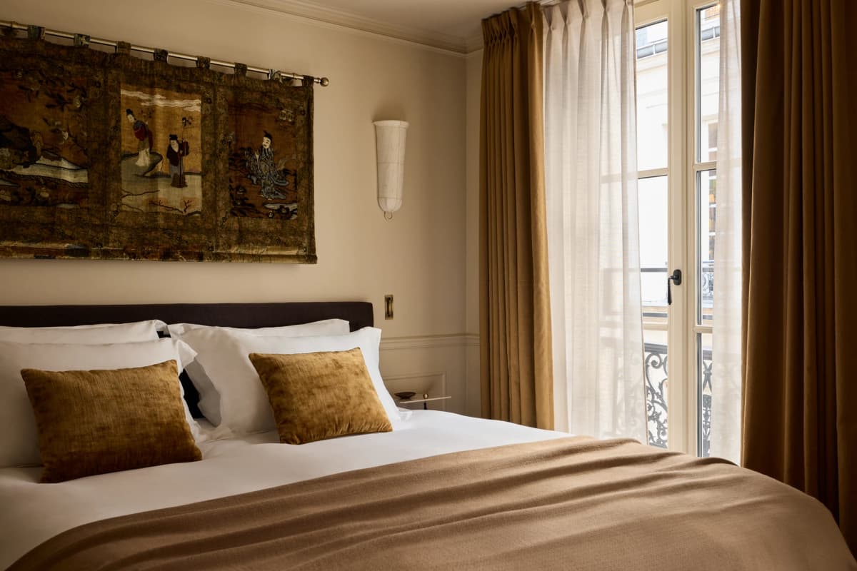 Dark, intimate interior at Hotel l'Opale Noire in Paris